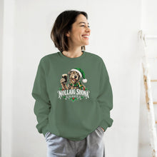 Load image into Gallery viewer, A woman wearing a sage green crewneck sweatshirt with a 'NOLLAIG SHONA & SLÁINTE' christmas graphic on the front, paired with gray sweatpants, standing against a white wall.