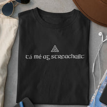 Load image into Gallery viewer, Tá mé ag streachailt T-shirt - Urban Celt